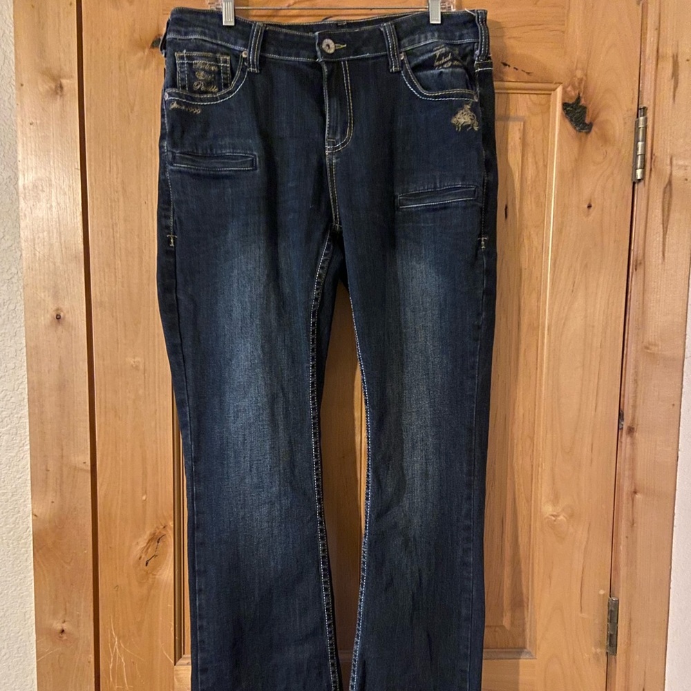 Cowgirl tuff Lisa’s  legacy dark jeans